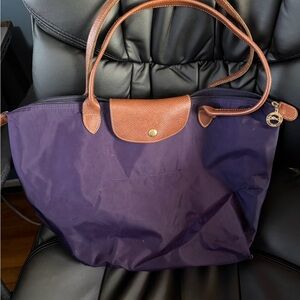 Longchamp purple tote. Sold as is.